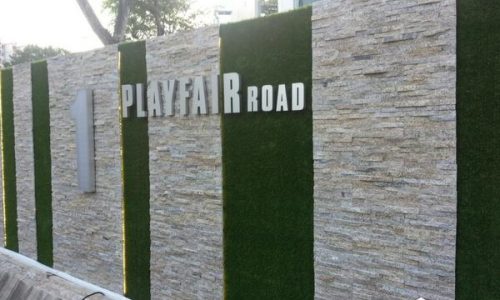 Artificial-turf-and-wall-tiles-design